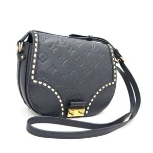 100% authentic Louis Vuitton Monogram Implant Juno